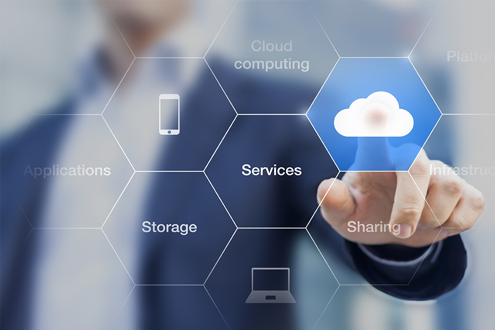 Businessperson in a suit selecting cloud technology solutions